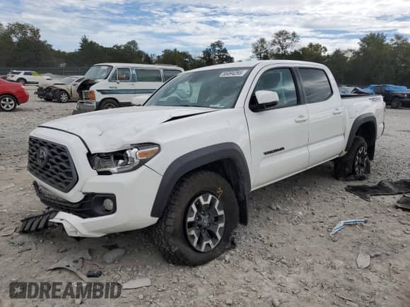 2022 Toyota Tacoma TRD Off Road with VIN 3TYCZ5AN4NT099666, listed as a Copart auction lot 85094295 with 45,880 mi miles and Salvage title. Bid and sale history available at DreamBid. Image 1.