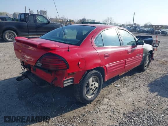 2001 Pontiac Grand Am SE1 with VIN 1G2NF52T41C202658, listed as a IAAI auction lot 42062228 with 127,215 mi miles and . Bid and sale history available at DreamBid. Image 4.