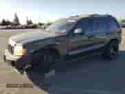 2006 Jeep Grand Cherokee Limited with VIN 1J4HS58N56C342300, listed as a Copart auction lot 70997415 with 167,201 mi miles and Salvage title. Bid and sale history available at DreamBid. Image 1.