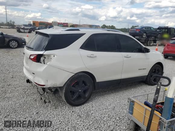 2020 Chevrolet Equinox Premier с VIN 2GNAXYEX2L6108109, выставлен на аукционе Copart как лот 70452035 с пробегом 71 606 миль миль и Списание • Salvage title. История ставок и продаж доступна на DreamBid. Изображение 3.