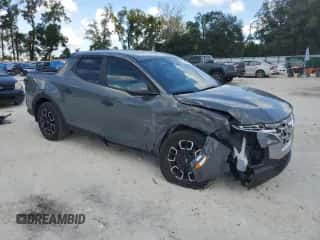 2023 Hyundai Santa Cruz SEL с VIN 5NTJB4AE1PH057774, выставлен на аукционе Copart как лот 77602214 с пробегом 25 938 миль миль и На запчасти • Non repairable. История ставок и продаж доступна на DreamBid. Изображение 4.