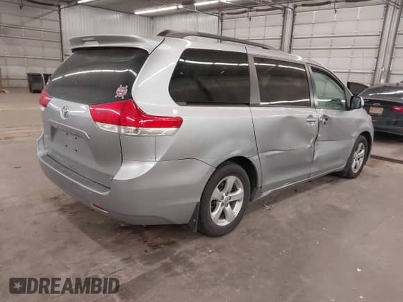 2012 Toyota Sienna LE AAS with VIN 5TDKK3DC2CS265495, listed as a IAAI auction lot 42890699 with 227,296 mi miles and . Bid and sale history available at DreamBid. Image 4.