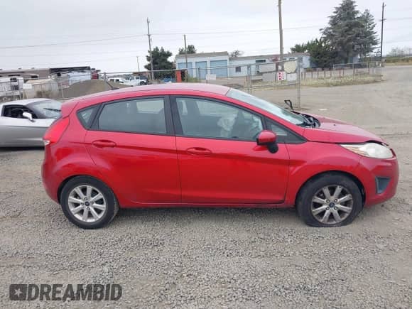 2011 Ford Fiesta SE with VIN 3FADP4EJXBM145705, listed as a IAAI auction lot 42920671 with 85,836 mi miles and . Bid and sale history available at DreamBid. Image 14.