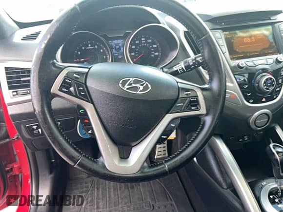 2016 Hyundai Veloster с VIN KMHTC6AD4GU281033, выставлен на аукционе Copart как лот 85571595 с пробегом 149 490 миль миль и Чистый • Clean title. История ставок и продаж доступна на DreamBid. Изображение 13.