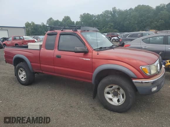 2002 Toyota Tacoma z VIN 5TEWM72N82Z119904, wystawiony jako Copart lot #67544245 z przebiegiem 257 827 mil mil oraz Czysty tytuł • Clean title. Historia ofert i sprzedaży dostępna na DreamBid. Obrazek 4.