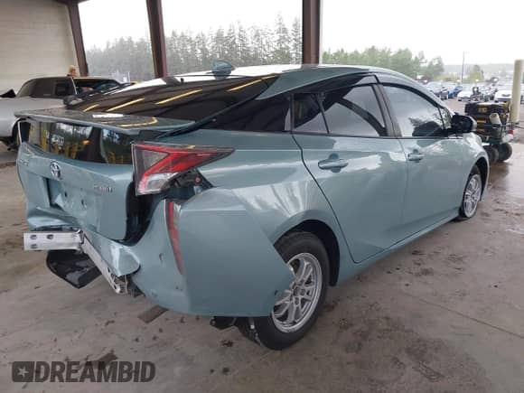 2016 Toyota Prius Four z VIN JTDKARFU9G3024875, wystawiony jako IAAI lot #42314235 z przebiegiem 101 383 mil mil oraz . Historia ofert i sprzedaży dostępna na DreamBid. Obrazek 4.