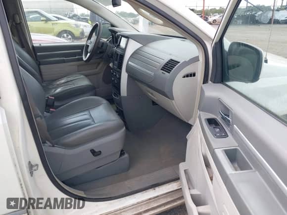 2009 Dodge Grand Caravan SXT z VIN 2D8HN54X39R625909, wystawiony jako IAAI lot #42849901 z przebiegiem 129 469 mil mil oraz . Historia ofert i sprzedaży dostępna na DreamBid. Obrazek 5.