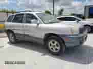 2003 Hyundai Santa Fe GLS z VIN KM8SC13DX3U442040, wystawiony jako Copart lot #61074175 z przebiegiem 20 318 mil mil oraz Szkoda całkowita • Salvage title. Historia ofert i sprzedaży dostępna na DreamBid. Obrazek 4.