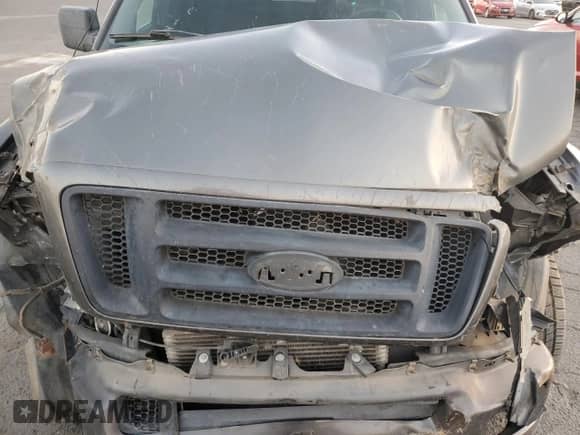 2005 Ford F-150 XL z VIN 1FTRF14525NB46069, wystawiony jako Copart lot #79868054 z przebiegiem 108 703 mil mil oraz Szkoda całkowita • Salvage title. Historia ofert i sprzedaży dostępna na DreamBid. Obrazek 11.
