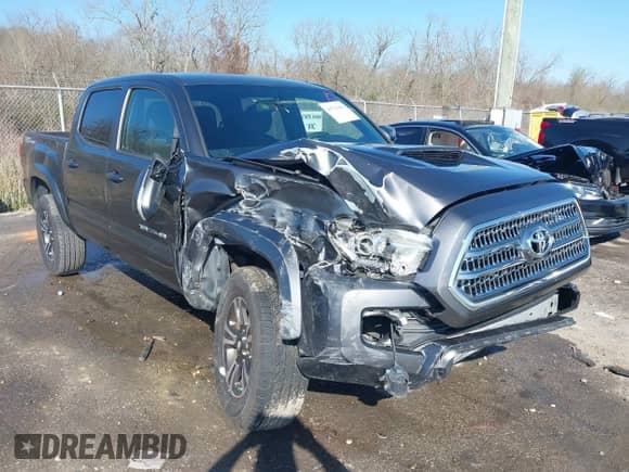 2017 Toyota Tacoma TRD Off Road with VIN 5TFAZ5CN2HX027623, listed as a IAAI auction lot 41731461 with 103,232 mi miles and . Bid and sale history available at DreamBid. Image 1.