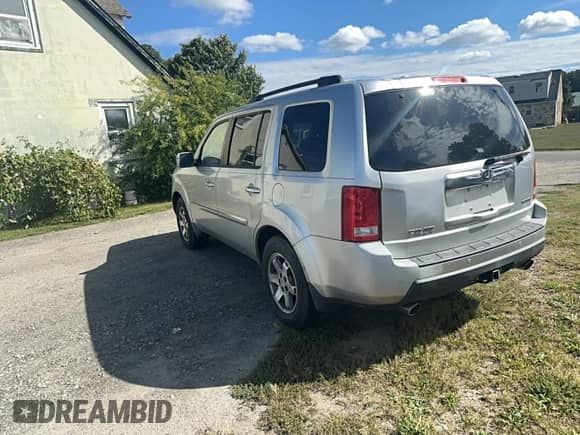 2010 Honda Pilot Touring с VIN 5FNYF4H88AB019661, выставлен на аукционе Copart как лот 85937495 с пробегом 188 907 миль миль и Чистый • Clean title. История ставок и продаж доступна на DreamBid. Изображение 3.