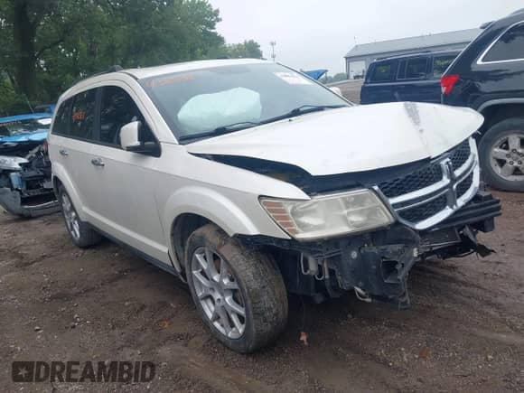 2012 Dodge Journey Crew with VIN 3C4PDCDG3CT342092, listed as a IAAI auction lot 42883811 with 153,298 mi miles and . Bid and sale history available at DreamBid. Image 1.