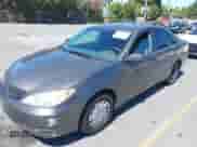 2005 Toyota Camry STD with VIN 4T1BE32K15U989898, listed as a IAAI auction lot 42880938 with 210,464 mi miles and . Bid and sale history available at DreamBid. Image 2.