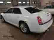 2013 Chrysler 300 with VIN 2C3CCARG6DH505220, listed as a IAAI auction lot 41944437 with 196,548 mi miles and . Bid and sale history available at DreamBid. Image 3.