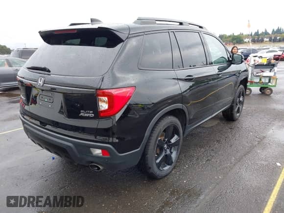 2021 Honda Passport Elite z VIN 5FNYF8H07MB012125, wystawiony jako IAAI lot #43334166 z przebiegiem 40 204 mil mil oraz . Historia ofert i sprzedaży dostępna na DreamBid. Obrazek 4.