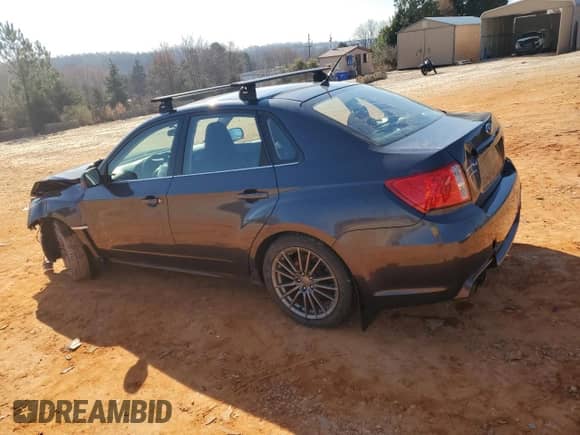 2012 Subaru WRX WRX with VIN JF1GV7E61CG018093, listed as a Copart auction lot 46181275 with 87,626 mi miles and Salvage title. Bid and sale history available at DreamBid. Image 2.