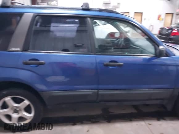 2004 Subaru Forester X with VIN JF1SG63624H706861, listed as a IAAI auction lot 42297575 with 185,120 mi miles and . Bid and sale history available at DreamBid. Image 13.