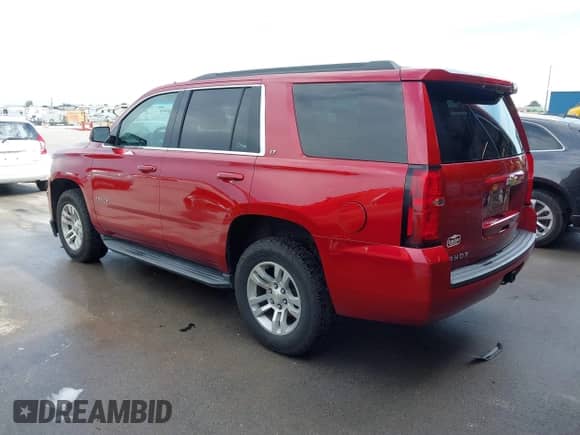 2015 Chevrolet Tahoe LT z VIN 1GNSKBKC9FR126438, wystawiony jako IAAI lot #43276273 z przebiegiem 92 503 mil mil oraz . Historia ofert i sprzedaży dostępna na DreamBid. Obrazek 3.