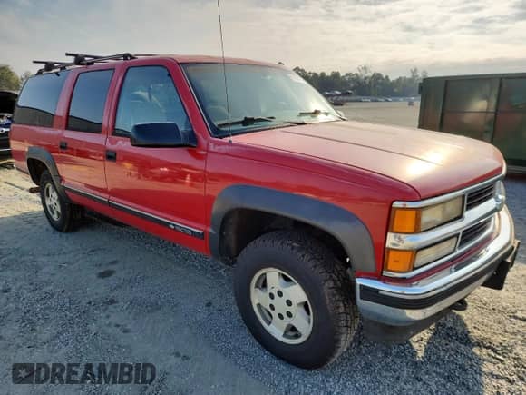 1995 Chevrolet Suburban с VIN 1GNFK16K1SJ337056, выставлен на аукционе Copart как лот 81636005 с пробегом 260 244 миль миль и Чистый • Clean title. История ставок и продаж доступна на DreamBid. Изображение 4.