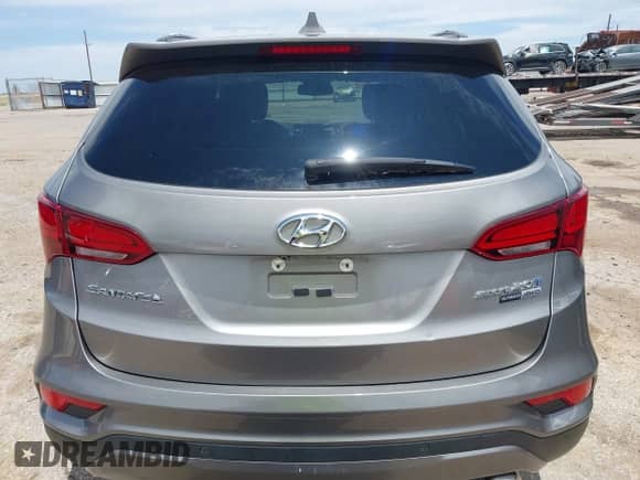 2018 Hyundai Santa Fe Ultimate with VIN 5XYZWDLAXJG531204, listed as a IAAI auction lot 42473418 with 90,726 mi miles and . Bid and sale history available at DreamBid. Image 16.