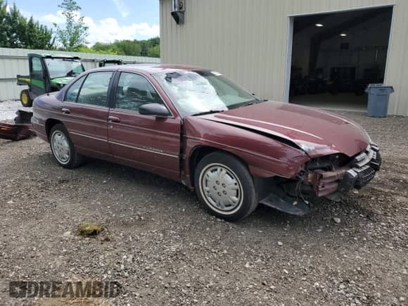 1999 Chevrolet Lumina LS with VIN 2G1WL52M7X9188085, listed as a Copart auction lot 62547605 with 67,582 mi miles and Salvage title. Bid and sale history available at DreamBid. Image 4.