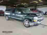 2001 Chevrolet Silverado 1500 with VIN 2GCEC19W411137247, listed as a Copart auction lot 54449525 with 253,035 mi miles and Salvage title. Bid and sale history available at DreamBid. Image 4.