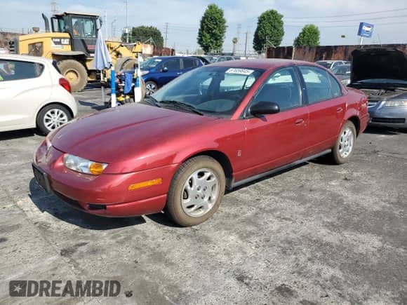 2000 Saturn SL with VIN 1G8ZK527XYZ209238, listed as a Copart auction lot 67659845 with 195,212 mi miles and Clean title. Bid and sale history available at DreamBid. Image 1.