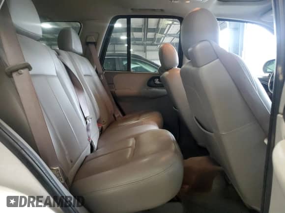 2007 Chevrolet TrailBlazer LT z VIN 1GNET13M772237513, wystawiony jako Copart lot #69974385 z przebiegiem 166 683 mil mil oraz Szkoda całkowita • Salvage title. Historia ofert i sprzedaży dostępna na DreamBid. Obrazek 11.