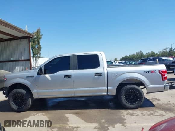 2018 Ford F-150 XL with VIN 1FTEW1CP6JKF36573, listed as a IAAI auction lot 42314415 with 121,240 mi miles and . Bid and sale history available at DreamBid. Image 15.