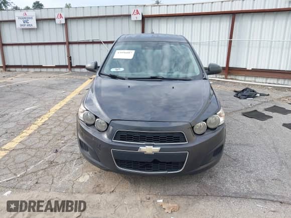 2016 Chevrolet Sonic LT z VIN 1G1JC5SH9G4157517, wystawiony jako IAAI lot #43096087 z przebiegiem 122 808 mil mil oraz . Historia ofert i sprzedaży dostępna na DreamBid. Obrazek 12.