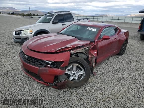 2023 Chevrolet Camaro 1LT z VIN 1G1FB1RSXP0128313, wystawiony jako Copart lot #81972115 z przebiegiem 57 663 mil mil oraz Szkoda całkowita • Salvage title. Historia ofert i sprzedaży dostępna na DreamBid. Obrazek 1.