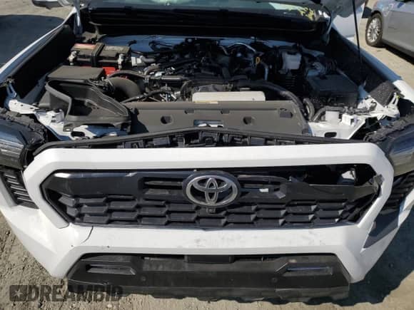 2024 Toyota Tacoma SR5 with VIN 3TMLB5JN4RM050957, listed as a Copart auction lot 71130595 with 1,873 mi miles and Salvage title. Bid and sale history available at DreamBid. Image 11.