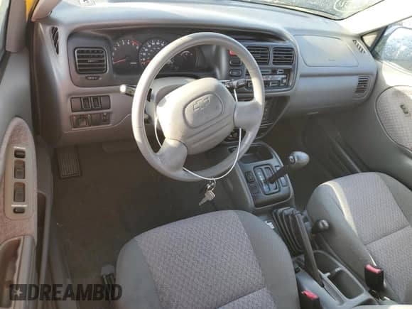 2002 Chevrolet Tracker с VIN 2CNBJ18C326943340, выставлен на аукционе Copart как лот 74628774 с пробегом Не указан миль и Списание • Salvage title. История ставок и продаж доступна на DreamBid. Изображение 8.