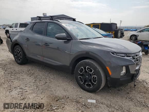 2022 Hyundai Santa Cruz SEL с VIN 5NTJC4AE0NH032374, выставлен на аукционе Copart как лот 71115415 с пробегом 30 044 миль миль и Списание • Salvage title. История ставок и продаж доступна на DreamBid. Изображение 4.