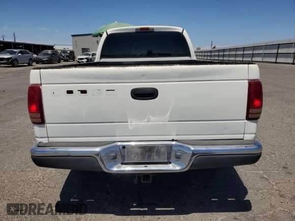 2001 Dodge Dakota с VIN 1B7GL22X61S284459, выставлен на аукционе Copart как лот 65877245 с пробегом 239 965 миль миль и Списание • Salvage title. История ставок и продаж доступна на DreamBid. Изображение 10.