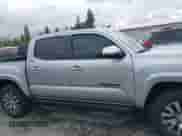 2022 Toyota Tacoma Limited with VIN 3TMGZ5AN2NM504615, listed as a IAAI auction lot 42261699 with 58,141 mi miles and . Bid and sale history available at DreamBid. Image 14.
