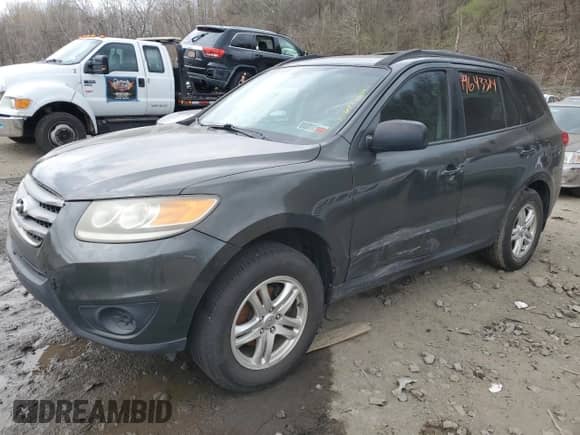 2012 Hyundai Santa Fe GLS z VIN 5XYZG3AB6CG126575, wystawiony jako Copart lot #49643314 z przebiegiem Nie podano mil oraz Czysty tytuł • Clean title. Historia ofert i sprzedaży dostępna na DreamBid. Obrazek 1.