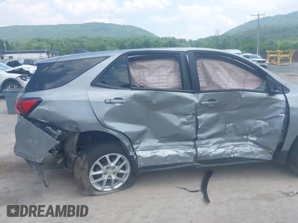 2023 Chevrolet Equinox LS z VIN 3GNAXSEG5PL197365, wystawiony jako IAAI lot #42419482 z przebiegiem 121 mil mil oraz . Historia ofert i sprzedaży dostępna na DreamBid. Obrazek 6.