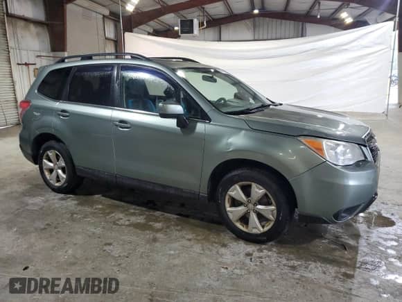 2014 Subaru Forester Limited z VIN JF2SJAJC4EH469915, wystawiony jako Copart lot #82171955 z przebiegiem 169 460 mil mil oraz Szkoda całkowita • Salvage title. Historia ofert i sprzedaży dostępna na DreamBid. Obrazek 4.
