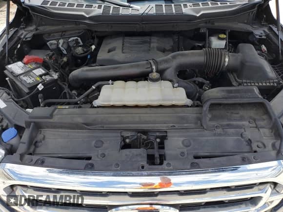 2021 Ford F-150 XL z VIN 1FTFW1E81MFA78366, wystawiony jako Copart lot #61080695 z przebiegiem 64 056 mil mil oraz Szkoda całkowita • Salvage title. Historia ofert i sprzedaży dostępna na DreamBid. Obrazek 11.