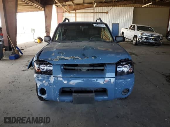 2003 Nissan Frontier XE with VIN 1N6ED29X63C443596, listed as a Copart auction lot 69464285 with 262,770 mi miles and Salvage title. Bid and sale history available at DreamBid. Image 5.