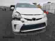 2014 Toyota Prius Three with VIN JTDKN3DU1E1740795, listed as a IAAI auction lot 43330985 with 176,707 mi miles and . Bid and sale history available at DreamBid. Image 6.