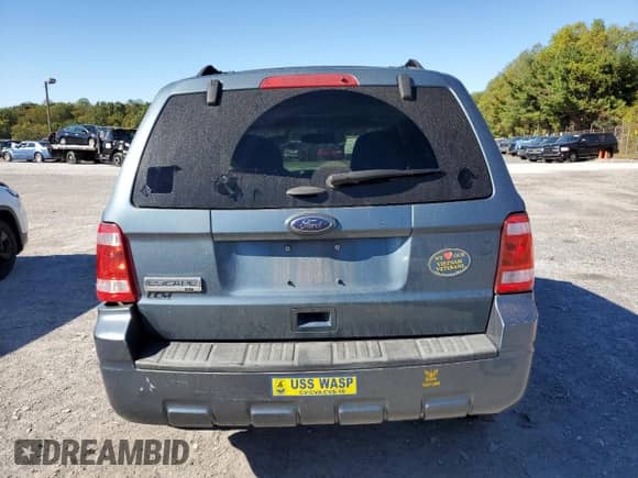 2011 Ford Escape XLT с VIN 1FMCU9D78BKB18572, выставлен на аукционе Copart как лот 86116525 с пробегом 133 869 миль миль и Списание • Salvage title. История ставок и продаж доступна на DreamBid. Изображение 6.
