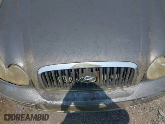 2003 Hyundai Sonata with VIN KMHWF25S93A739893, listed as a IAAI auction lot 42496457 with 152,038 mi miles and . Bid and sale history available at DreamBid. Image 6.