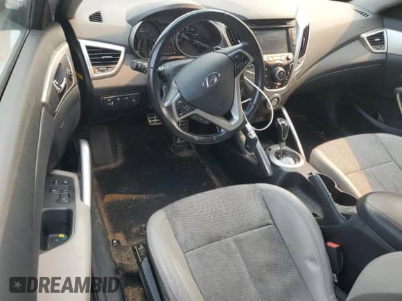 2014 Hyundai Veloster z VIN KMHTC6ADXEU187204, wystawiony jako Copart lot #71670725 z przebiegiem 94 917 mil mil oraz Czysty tytuł • Clean title. Historia ofert i sprzedaży dostępna na DreamBid. Obrazek 8.