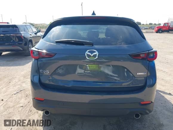 2025 Mazda CX-5 S Carbon Edition z VIN JM3KFBCM7S0587633, wystawiony jako IAAI lot #43335056 z przebiegiem 20 088 mil mil oraz . Historia ofert i sprzedaży dostępna na DreamBid. Obrazek 16.