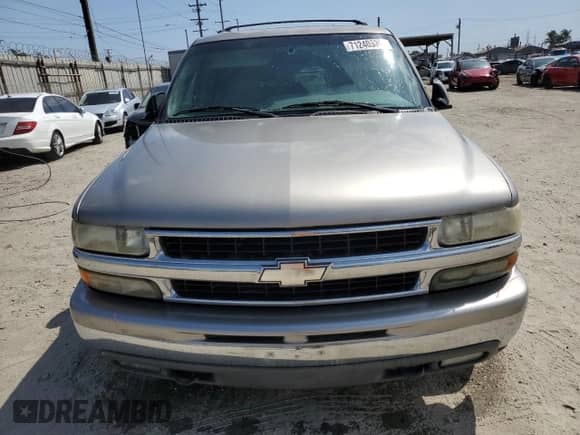 2001 Chevrolet Tahoe LS with VIN 1GNEC13T41R133700, listed as a Copart auction lot 71240535 with 143,051 mi miles and Salvage title. Bid and sale history available at DreamBid. Image 5.
