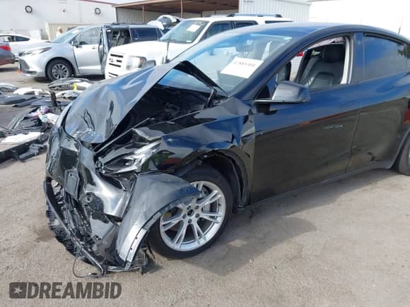2023 Tesla Model Y Long Range с VIN 7SAYGAEE1PF594220, выставлен на аукционе IAAI как лот 42885301 с пробегом 94 878 миль миль и . История ставок и продаж доступна на DreamBid. Изображение 6.