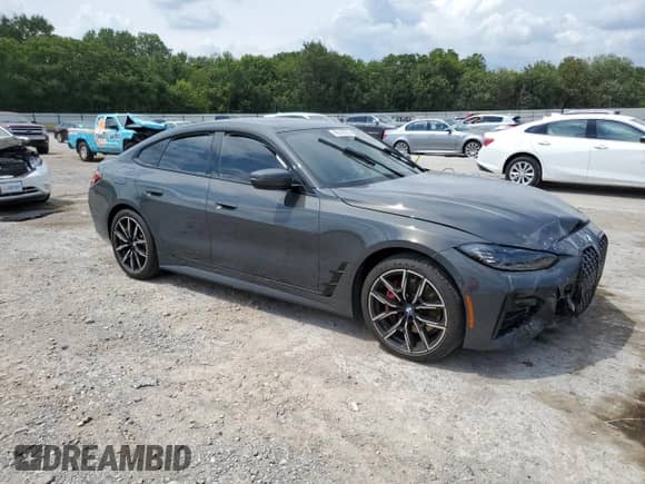 2022 BMW 4 Series 430i с VIN WBA63AV02NFM09568, выставлен на аукционе Copart как лот 68145555 с пробегом Не указан миль и Списание • Salvage title. История ставок и продаж доступна на DreamBid. Изображение 4.