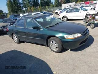 1999 Honda Accord EX with VIN 1HGCG1656XA024696, listed as a IAAI auction lot 43306615 with 146,475 mi miles and . Bid and sale history available at DreamBid. Image 1.